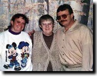 Glenn Early with his sister and mother